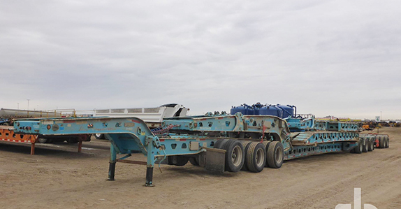 Lowboy Trailer for sale at Ritchie Bros Lowboy Trailer sold at Ritchie Bros.